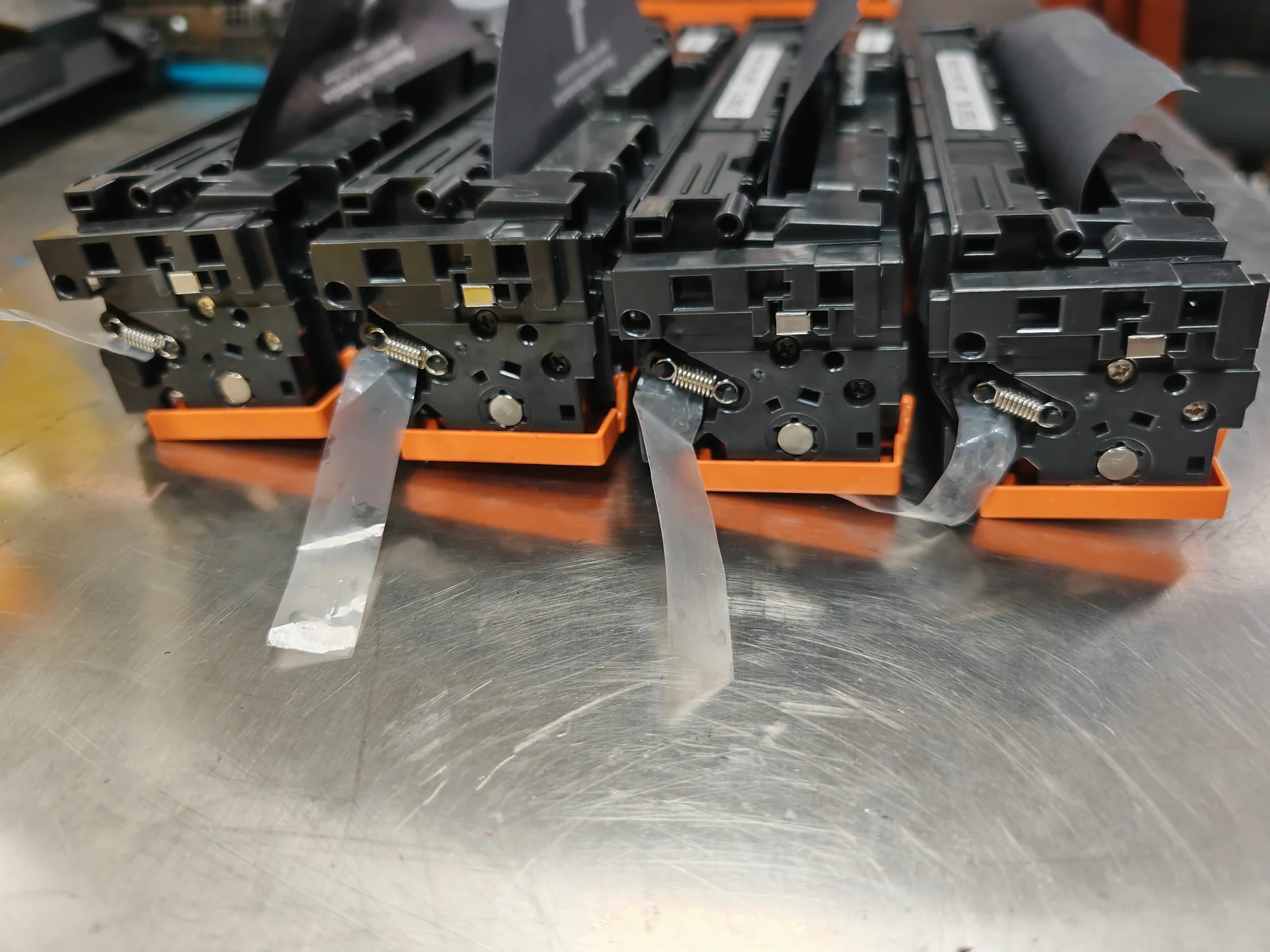 Real batch photo of compatible Canon CRG067 toner cartridges for CMYK order reference